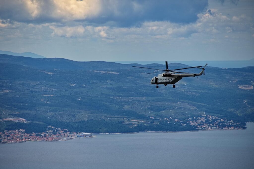 Helicopter flying over the sea